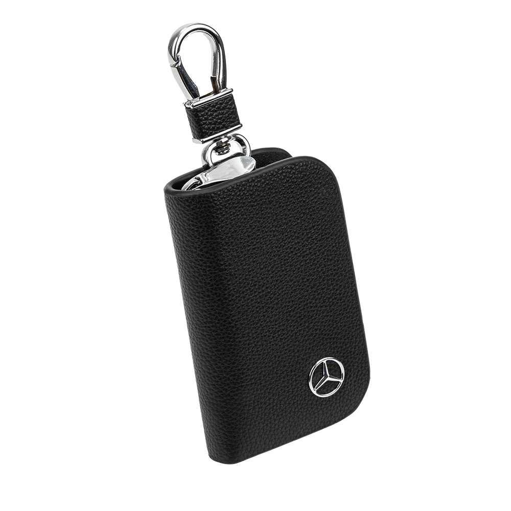 Mercedes-Benz Trucks leather key pouch in black with carabiner hook and embossed star logo, front view.